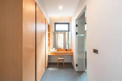 a hallway with a desk and a chair in a bathroom at New 3BR Pool Villa Long One A5 with Chalong Bay view in Chalong