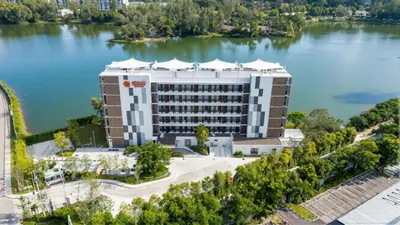 an overhead view of a hotel on a lake at ANGSANA Oceanview Apartments with a privat pool in Laguna area in Bang Tao Beach