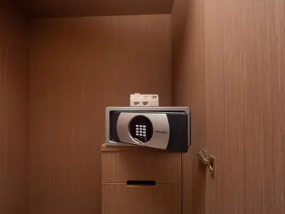 a small television sitting on top of a door at ANGSANA Oceanview apartments with jacuzzi in Laguna area in Bang Tao Beach