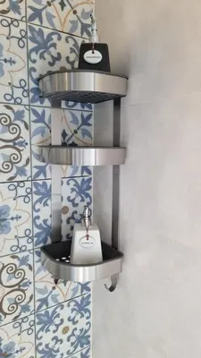 a bathroom with a shelf with a sink on a wall at Bright Apartment Close to Amazing Beach ! 39 Sqm in Nai Yang Beach
