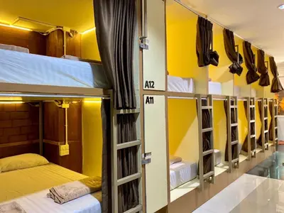 a row of bunk beds in a dorm room at LONGDOO Hostel in Phi Phi Don