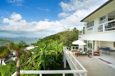 an ocean view from the balcony of a house at Stunning 5 bedrooms Villa with Panoramic Sea View in Por Bay