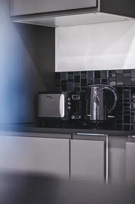 a coffee pot on a counter in a kitchen at Mango Hill Residence in Rawai Beach