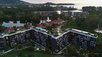 an aerial view of a resort with a lake at Modern 2-bedroom Apartments. Skypark Laguna (Bang Tao) in Bang Tao Beach