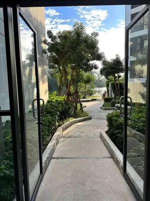 a view of a sidewalk from a window of a building at Cassia Residences in Phuket Town