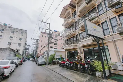 a row of motorcycles parked in front of a building at Sunstar Palace Patong in Patong Beach