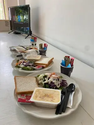 a table with three plates of food on it at KRABI MORE HOTEL in Klong Muang Beach