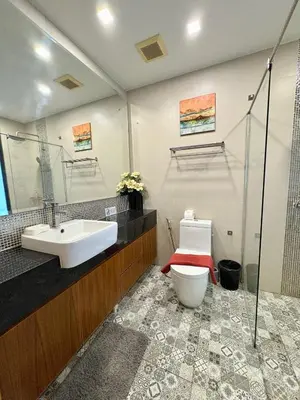 a bathroom with a sink and a toilet at Large Luxurious 1-bedroom condos in Rawai in Rawai Beach