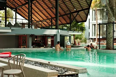 a group of people in the swimming pool at a hotel at City Gate Kamala B607 by Phuket Sabay Rent in Kamala Beach