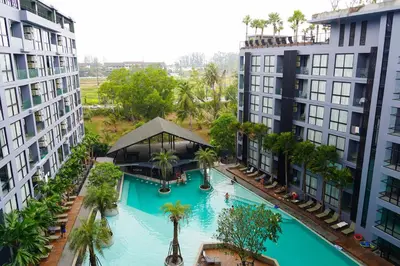 an overhead view of a swimming pool in between two buildings at City Gate Kamala B607 by Phuket Sabay Rent in Kamala Beach