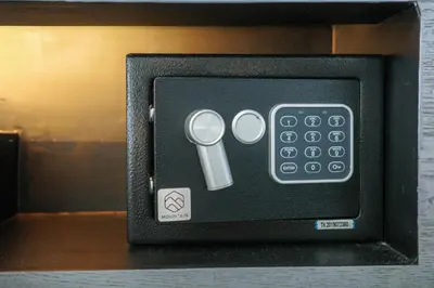a small black box with a remote control at City Gate Kamala B607 by Phuket Sabay Rent in Kamala Beach