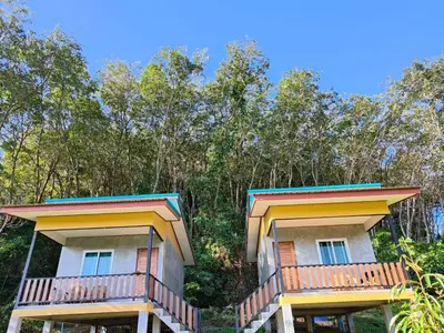a house with two balconies on top of it at Baanchomjan Kohyaoyai in Ban Nai Wat
