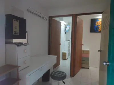a bathroom with a white counter and a sink at Phuket Palace apartment with 2 separate rooms in Patong Beach