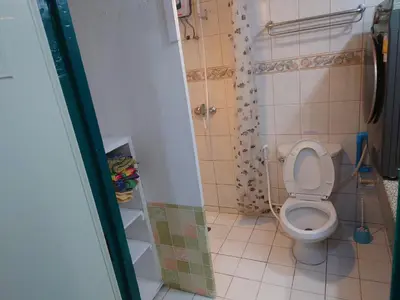 a bathroom with a toilet and a shower at Phuket Palace apartment with 2 separate rooms in Patong Beach