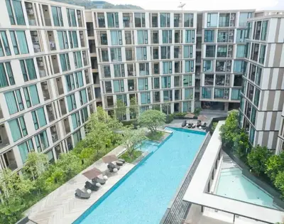 an aerial view of an apartment complex with a swimming pool at Luxury condo in phuket shopping center in Phuket Town