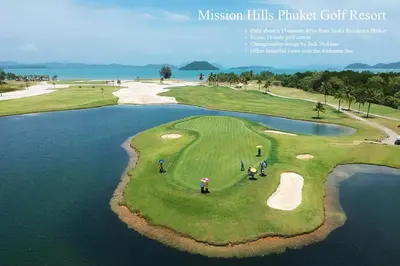 a group of people on a golf course next to the water at Luxury Beachfront AMANA Villa 4 Br at Ta-Ke Residence A in Phuket Town