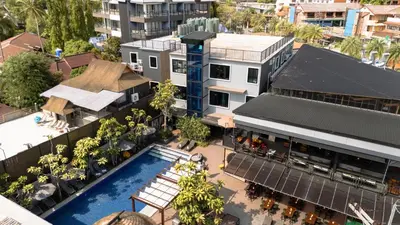 an overhead view of a building with a swimming pool at Sea Beach Hostel & Club Beachfront 18-39 years only in Ao Nang Beach