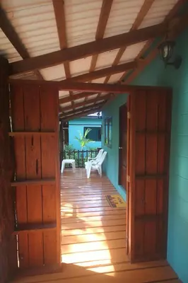 an open door to a room with a wooden floor at Baan Pongam Resort in Ao Nang Beach