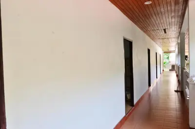 a hallway of a house with a wooden ceiling at Heimat Garden - Your Home in Koh Yao Yai in Ban Lo Pa Ret