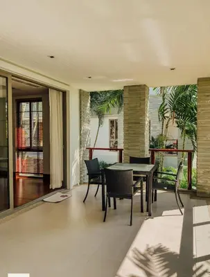 a dining room with a table and chairs at Pearl of Naithon 3 bedrooms in Nai Thon Beach