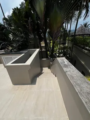 a concrete bench on the side of a building at The Residence Resort in Phuket Town