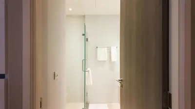 a bathroom with a shower with a glass door at Diamond Apartment with Terrace near Bang Tao Beach in Bang Tao Beach