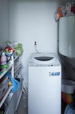 a laundry room with a washer and a toilet at Вилла с бассейном на Най Харн, 2 спальни G3 in Rawai Beach