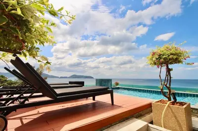 a view of the ocean from the deck of a villa at Luxury Rooftop Penthouse in Kamala Beach