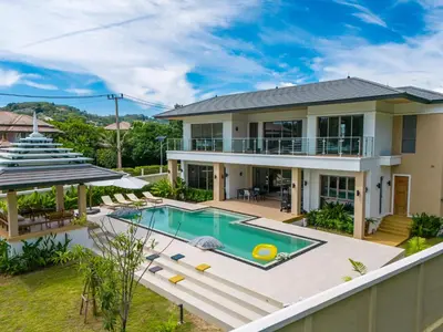 an aerial view of a house with a swimming pool at 5 Bdr 18 meter Pool villa in Laguna Phuket in Phuket Town