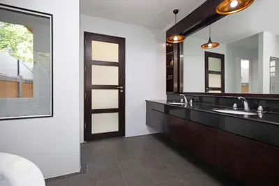 a bathroom with a sink and a mirror at Tropical 3BR Pool Villa Prima, just 5min Drive to NaiHarn and Rawai Beach in Rawai Beach
