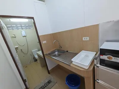 a small bathroom with a sink and a shower at Rawai-Casevacanze in Rawai Beach
