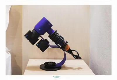 a blue microscope sitting on top of a table at Kamala Havana Hotel and Cafe in Kamala Beach