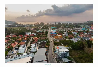 an aerial view of a city with houses and roads at Kamala Havana Hotel and Cafe in Kamala Beach