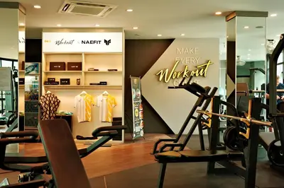 a store with a gym with a sign that says make every month at City Gate Kamala D305 by Phuket Sabay Rent in Phuket Town