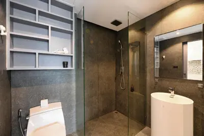 a bathroom with a toilet and a shower at City Gate Kamala D305 by Phuket Sabay Rent in Phuket Town