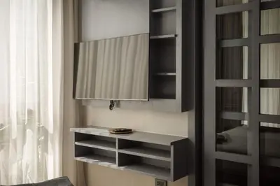 a kitchen with a cupboard and a shelf at City Gate Kamala N303 by Phuket Sabay Rent in Phuket Town