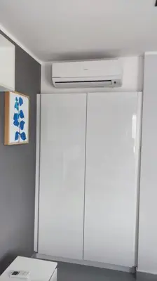 a room with two white cabinets and a ceiling at 1bed in Chalong