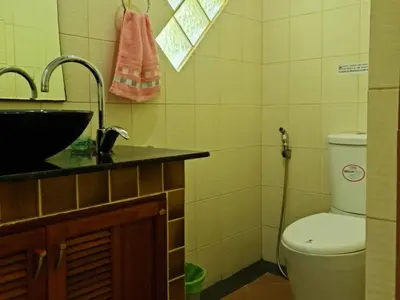 a bathroom with a sink and a toilet in it at Natures relax in Kamala Beach