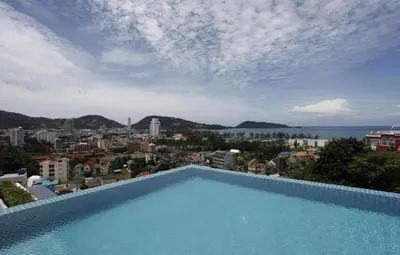 a swimming pool with a view of a city at Sea view apartment at The Unity by Lofty in Patong Beach