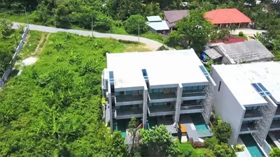 an overhead view of a building with trees at Villa Papaya @ Kamala Beach in Kamala Beach