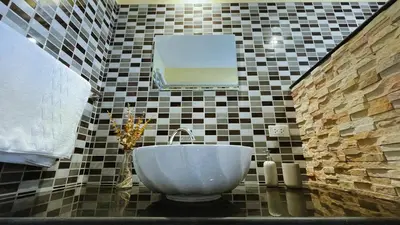 a bathroom with a sink and a mirror at Blackberry in Rawai Beach