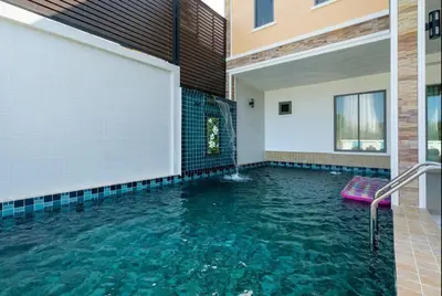 a swimming pool in the middle of a house at Pure Bliss Luxe 3BR Pool Villa Your Ultimate Tropical Getaway V29 V74 in Bang Tao Beach