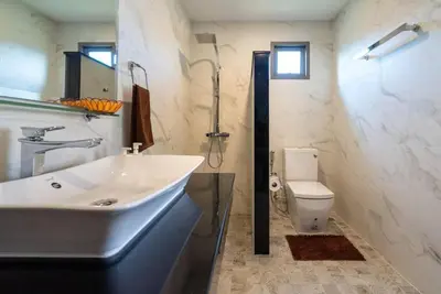 a bathroom with a sink and a toilet at Pure Bliss Luxe 3BR Pool Villa Your Ultimate Tropical Getaway V29 V74 in Bang Tao Beach
