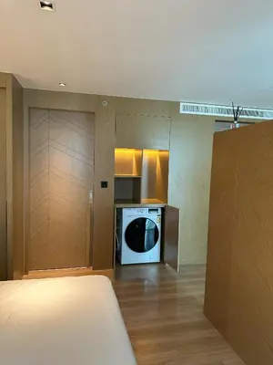 a kitchen with a washing machine in a room at Apartment in 5 hotel with sea view and waterpark in Rawai Beach