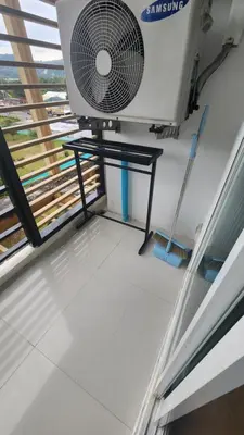 a room with a fan on the ceiling at Plus condominium 2 kathu in Kathu