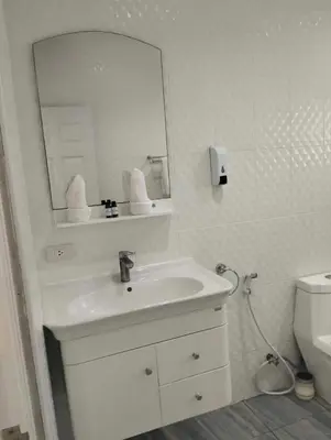 a white bathroom with a sink and a mirror at 2 Bedrooms Pool Villa in Kamala in Kamala Beach