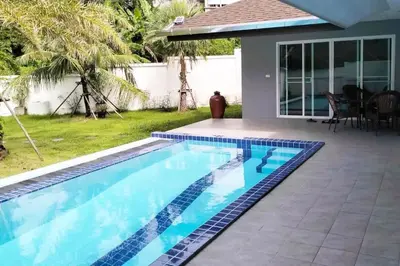 a swimming pool in the backyard of a house at 3 Bedrooms Pool Villa in Kamala in Kamala Beach