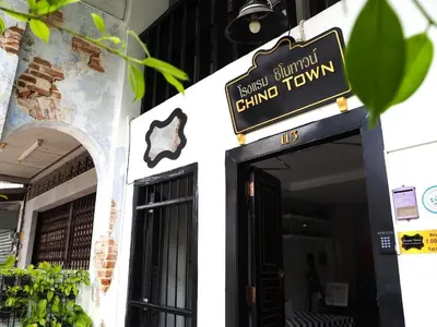 a sign for a grand tulum grand entry to a building at Chino Town Gallery Alley - SHA Plus in Phuket Town