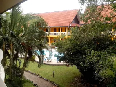 a view of a house with a swimming pool and trees at Sabai Residence in Ao Nang Beach