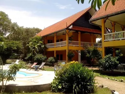 a resort with a pool and a house at Sabai Residence in Ao Nang Beach